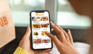 Woman placing a food order on her mobile phone.