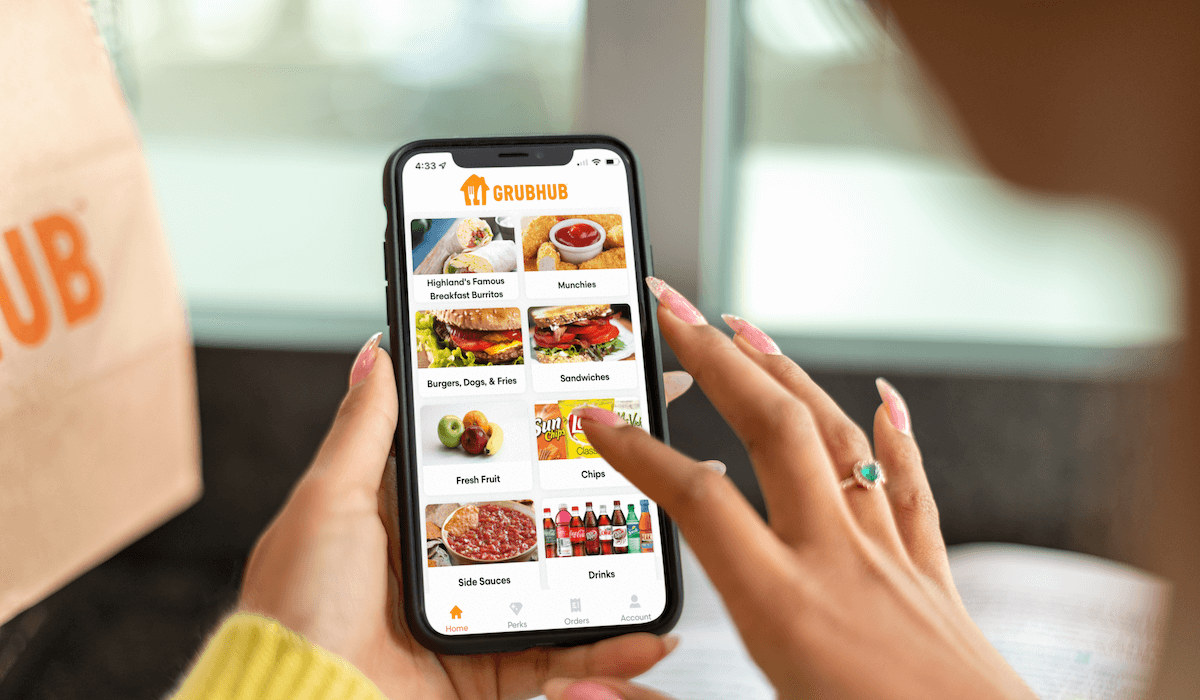 Woman placing a food order on her mobile phone.