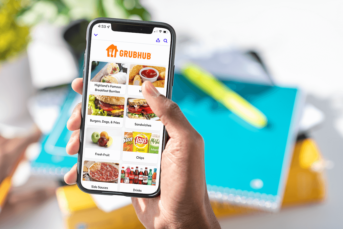 Person placing a mobile food order on the Grubhub app.